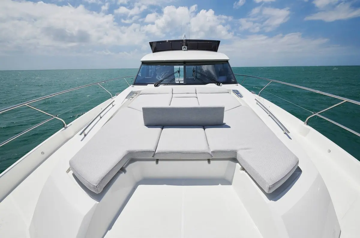 Prestige 590 Fly, aft deck — Luxury Yacht Sardinia, Sardinia. Flybridge comfort for calm Costa Smeralda days